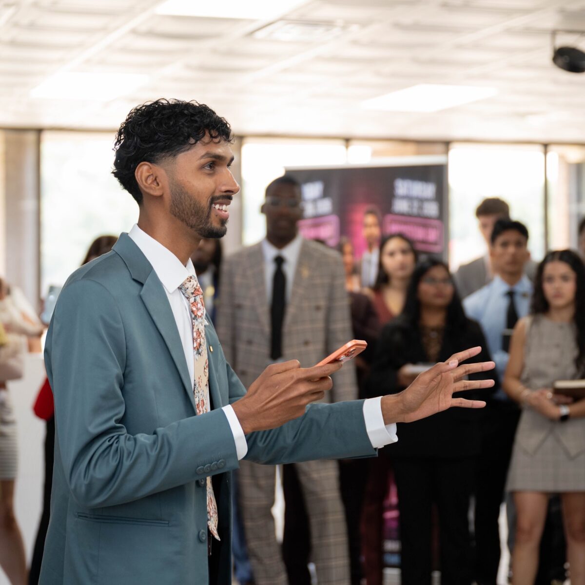 Bunny speaking at a White Rabbit International event